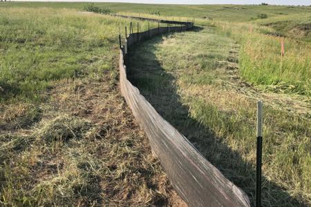 Clik to view full size Installed a mile of wired back silt fence in Black Forest, Colorado for erosion control