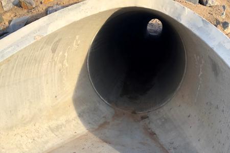 Clik to view full size Cleaned out the storm water pipe of all silt