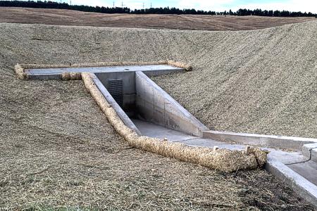 Clik to view full size Installed erosion control blanket and straw waddles in Colorado Springs, Colorado