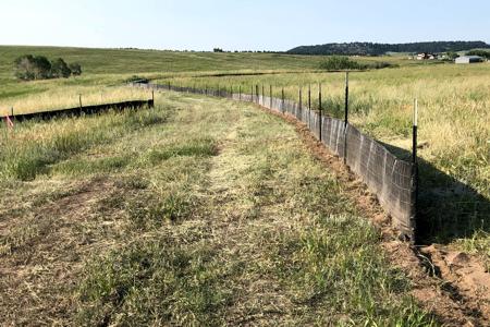 Clik to view full size Silt fence installed in Colorado Springs, Colorado