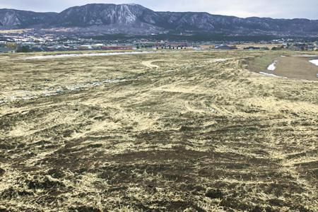 Erosion Contril in Monument, Colorado. Stabilizing the disturbed soil with seed and straw crimp to help with the grass seed