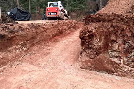 Excavating in Larkspur, Colorado. Excavated out an area for a new detached garage that was getting a foundation poured under it.