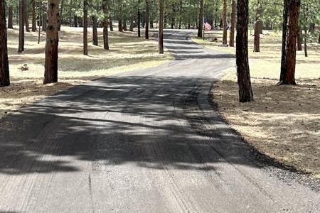 Driveway repair in Black Forest, Colorado using crushed asphalt