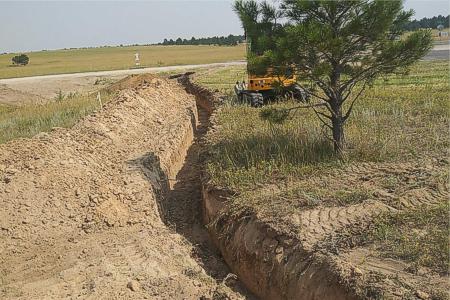 Clik to view full size Excavating a new gas line in Black Forest, Colorado