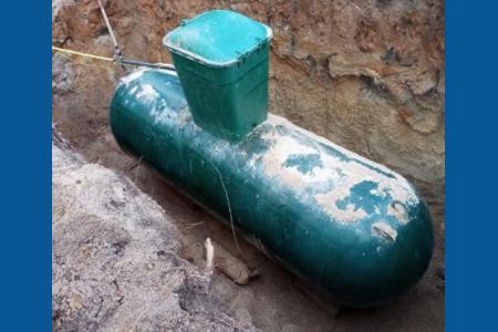 Clik to view full size Installing a 500 gallon in ground propane tank for a new barn in Larkspur, Colorado