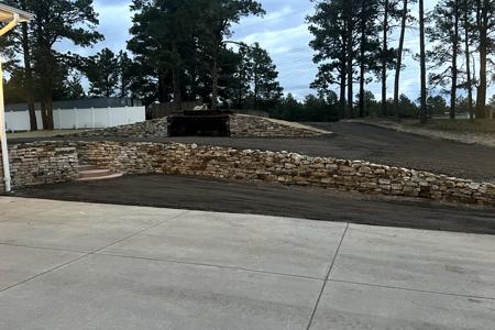 Siloam Stone retaining wall installed in Black Forest, Colorado to act as a retaining wall on the lower section for additional parking, upper Siloa