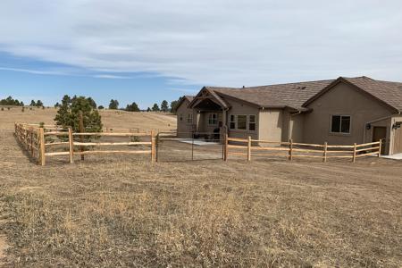 Clik to view full size Split rail fence Monument, Colorado