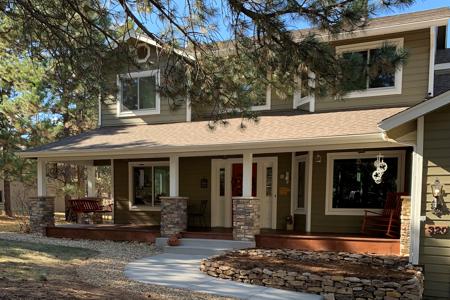 Click to view full size Front yard make over, veneer stone, Siloam stone retaining wall in Monument, Colorado