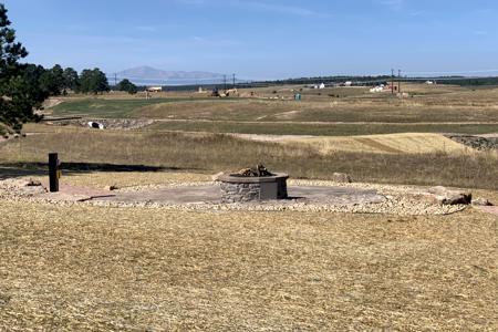 Click to view full size Gas fire pit and patio with an amazing view of Pikes Peak at Winsome in Black Forest, Colorado