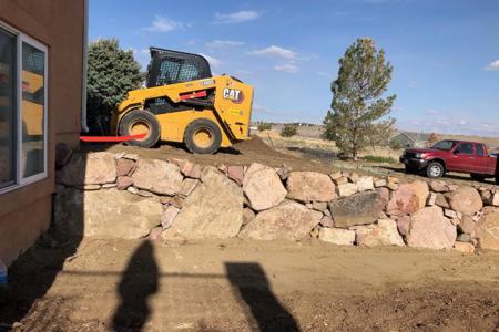 Click to view full size Retaining wall built for erosion control and to create a more workable yard for curb appeal in Colorado Springs