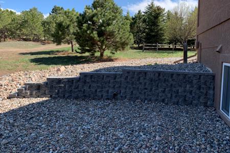 Click to view full size Retaining wall was built for erosion control and to direct the water in Monument, Colorado