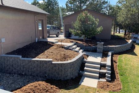 Click to view full size Retaining wall in Monument, Colorado to allow for more usable space as well as for erosion control.