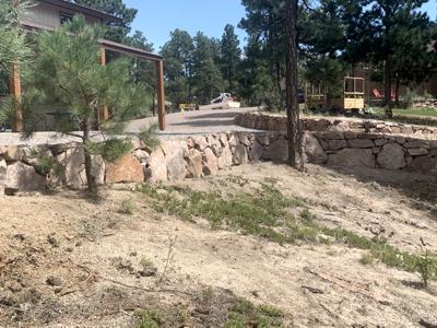 Click to view full size Boulder retaining wall in Black Forest, Colorado