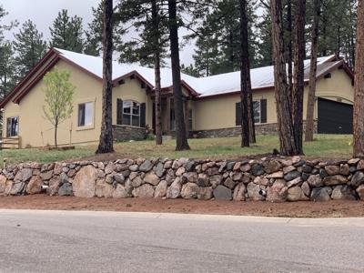 Click to view full size Boulder retaining wall in Black Forest, Colorado
