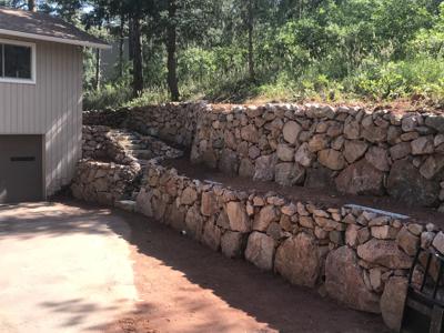 Click to view full size Boulder retaining wall with stairs in Perry Park Colorado
