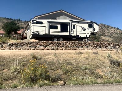Click to view full size Boulder retaining wall for RV Parking in Morison Colorado