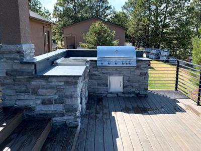 Clik to view full size A veneer stoned built in kitchen in Monument, Colorado