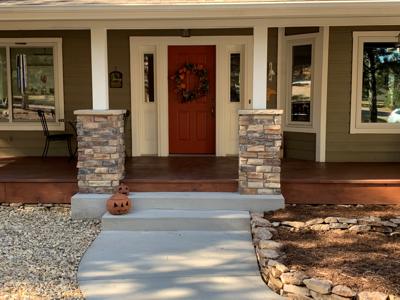 Clik to view full size Front porch columns in veneer stone for a nicer look in Monument, Colorado
