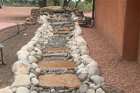 A bubbling rock at the entrance to a hone in Manitou Springs Colorado